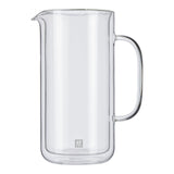 Clear glass pitcher with handle on a white background