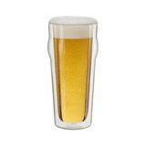 Double-walled glass with beer on a white background