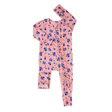 Pink baby romper with blue floral pattern on a white background