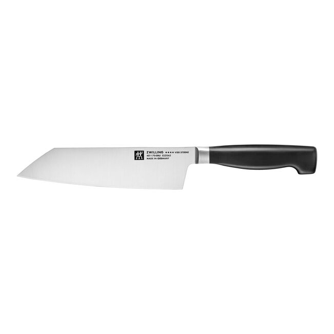 A Zwilling professional chef's knife with a silver stainless steel blade and a black handle, shown horizontally against a plain white background.