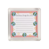 Notepad with 'Teachers change the world' text and Earth illustrations on a white background
