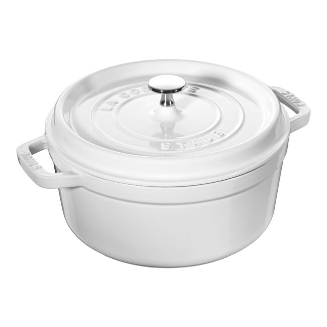 White ceramic cookware pot with lid on a white background