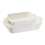 Set of two white ceramic baking dishes on a white background