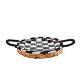 Woven basket with checkered lid on a white background