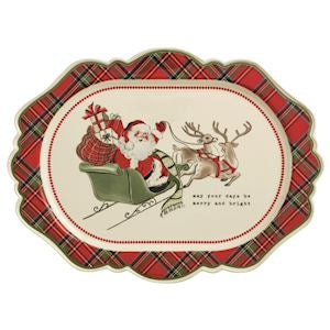 Decorative plate with Santa Claus, reindeer, and plaid border on a white background