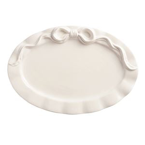 White decorative plate with a decorative edge on a white background
