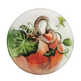 Decorative plate with a pumpkin design on a white background