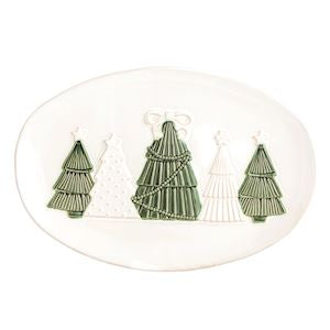 Three green tree-shaped earrings on a white oval background