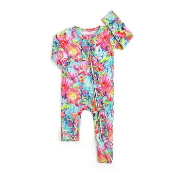 A floral patterned baby sleepwear with long sleeves and a zipper down the front.