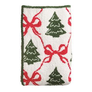 Festive towel with Christmas tree and bow pattern on a white background