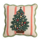 A square decorative throw pillow with a scalloped green border, featuring a cream and coral pink striped background and a central green embroidered Christmas tree with gold and red ornaments.