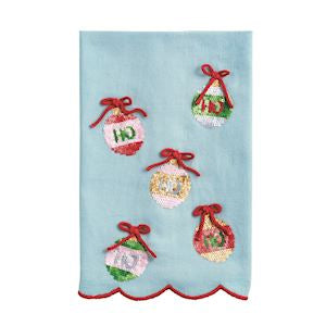 Decorative towel with embroidered Christmas ornaments on a light blue background