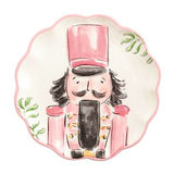 Decorative plate with a cartoon nutcracker design on a white background