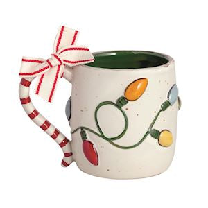 Mug with Christmas lights design and candy cane handle on a white background