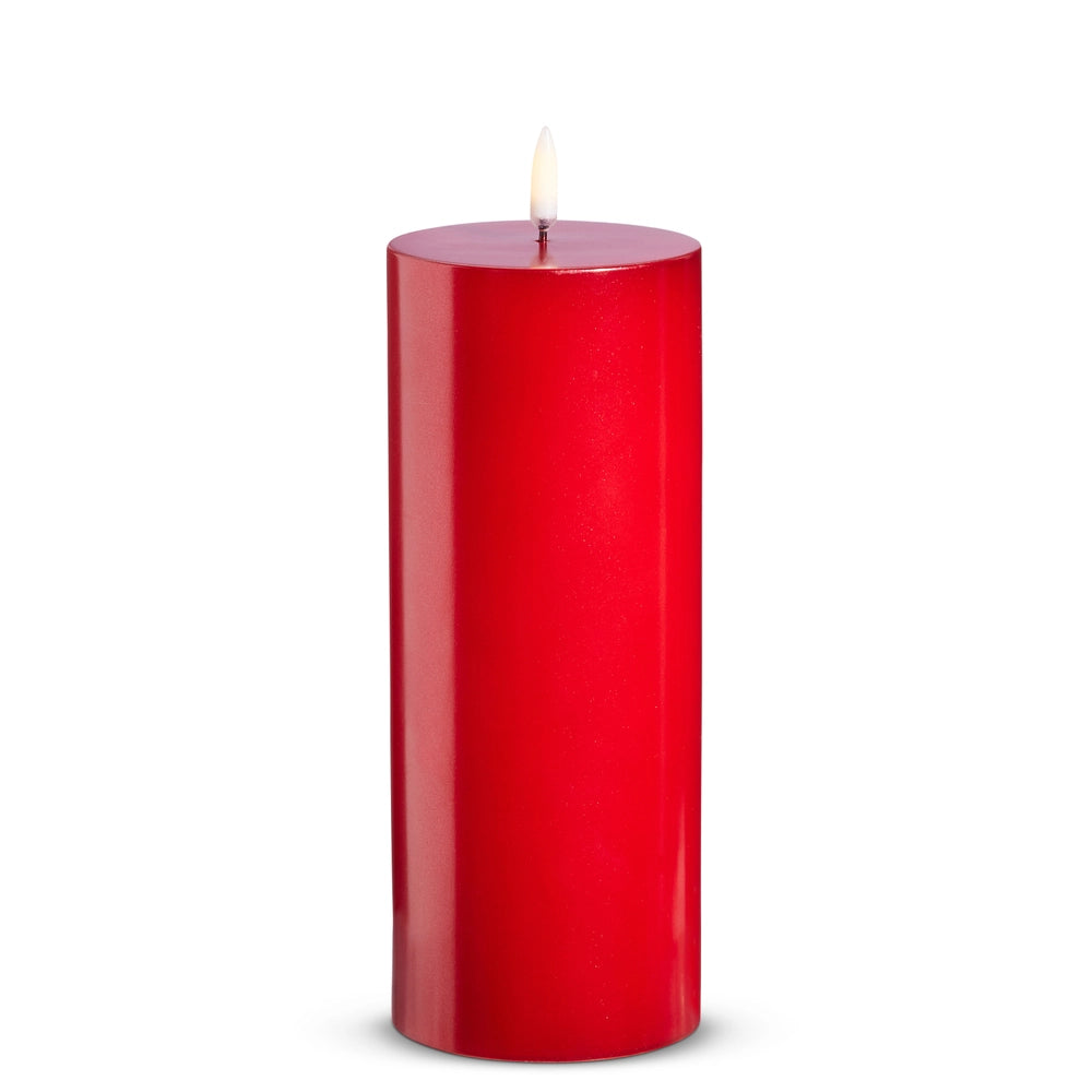 Red candle on a white background