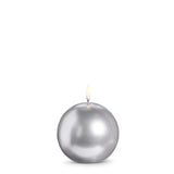 Silver spherical candle on a white background
