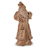 Decorative statue of a bearded figure in a long coat holding a lantern on a white background