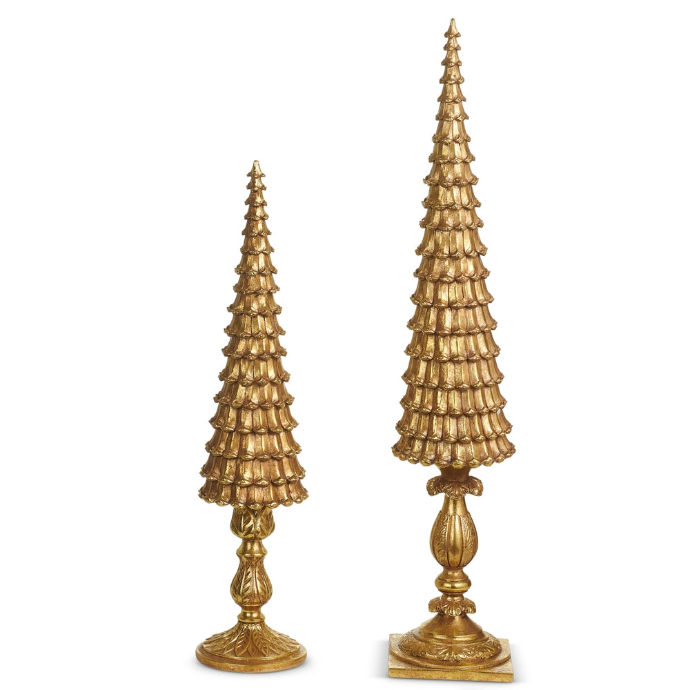 Two gold decorative trees on a white background