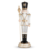 Decorative nutcracker figure with a white beard, black hat, and gold accents on a white background