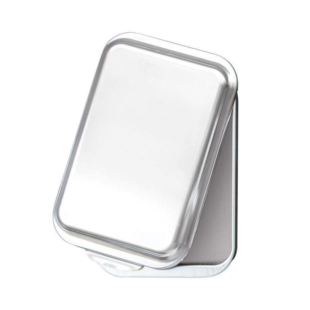 Rectangular metallic object on a white background
