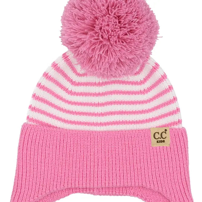 Pink and white striped beanie with a pom-pom on a white background
