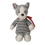 Stuffed toy wolf wearing a striped sweater with a red scarf on a white background