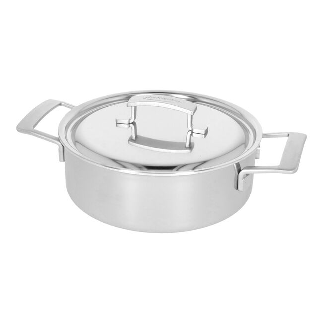 Stainless steel pot with lid on a white background