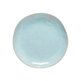 Light blue ceramic plate on a white background