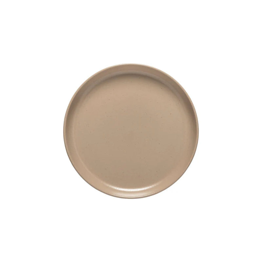 Beige ceramic plate on a white background