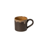 Black ceramic mug with a textured finish on a white background