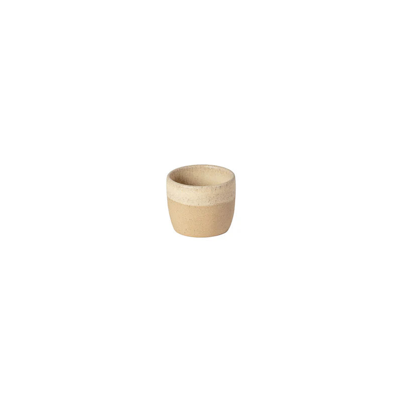 Gold bracelet with a green gemstone on a white background
