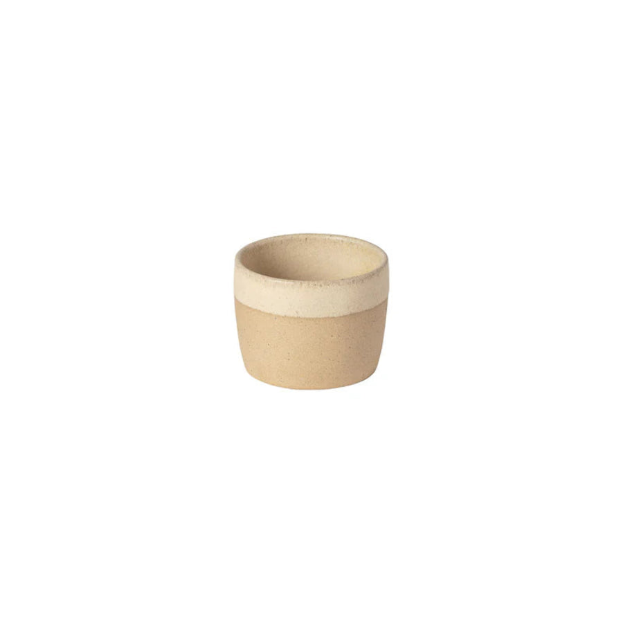 Small beige ceramic cup on a white background