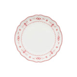 Decorative plate with red floral pattern on a white background