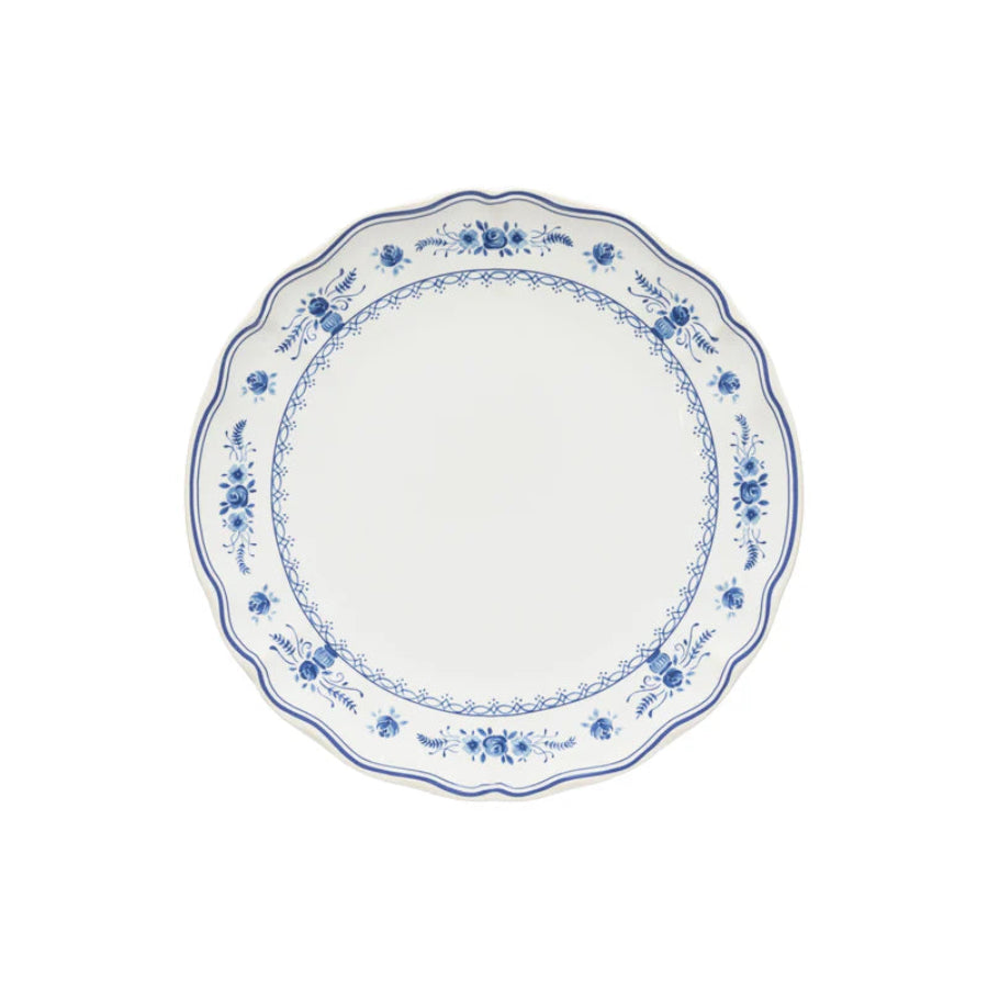 White plate with blue floral and decorative patterns on a white background