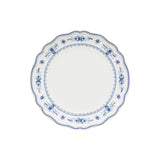 White plate with blue floral and decorative patterns on a white background
