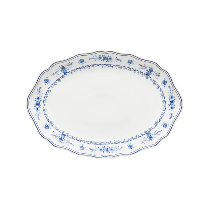 White oval platter with blue floral patterns on a white background