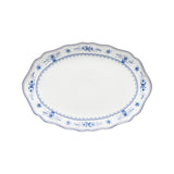 White oval platter with blue floral patterns on a white background