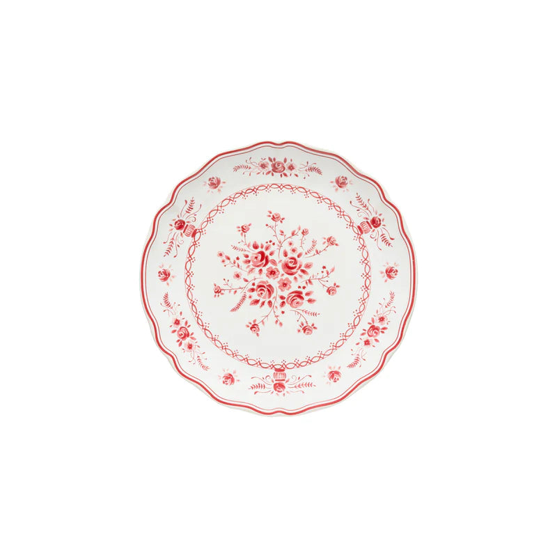 Decorative plate with red floral pattern on a white background