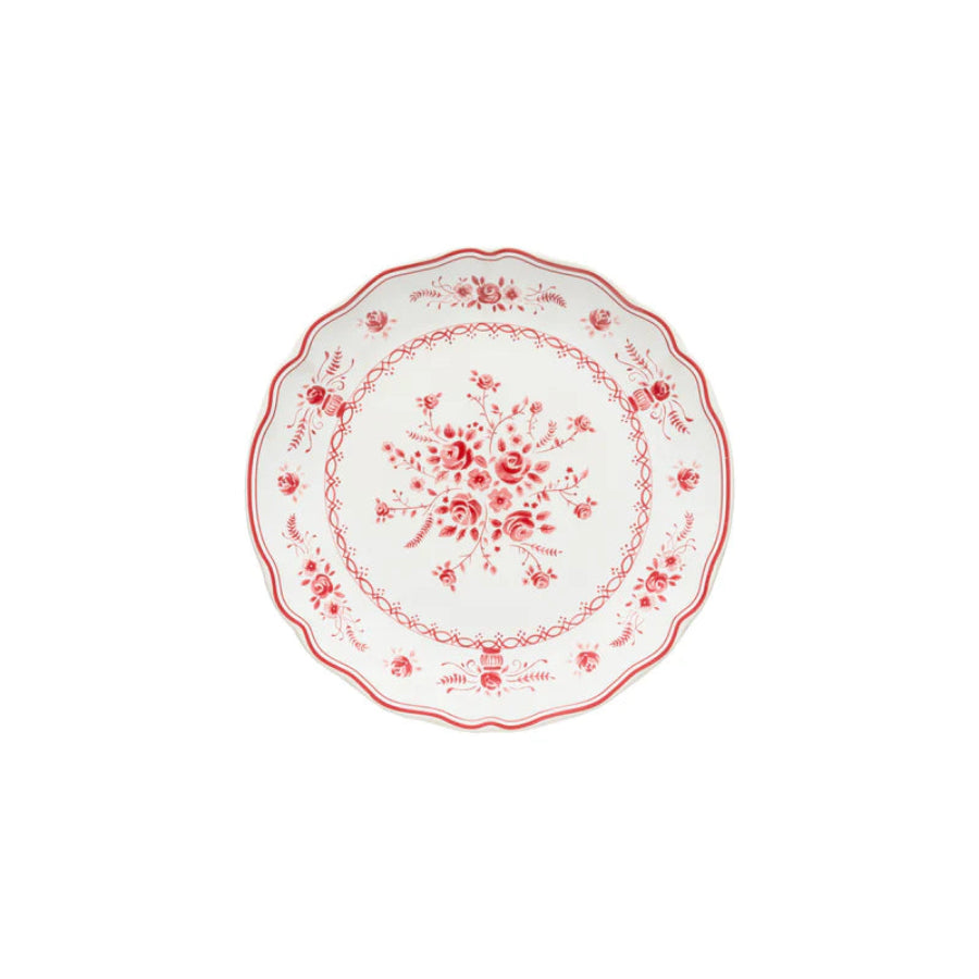 Decorative plate with red floral pattern on a white background