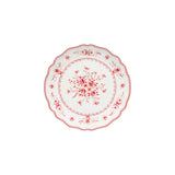 Decorative plate with red floral pattern on a white background
