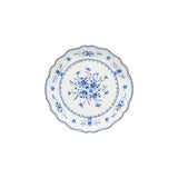Decorative plate with blue floral pattern on a white background