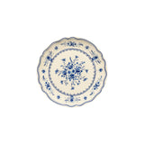 Decorative plate with blue floral pattern on a white background