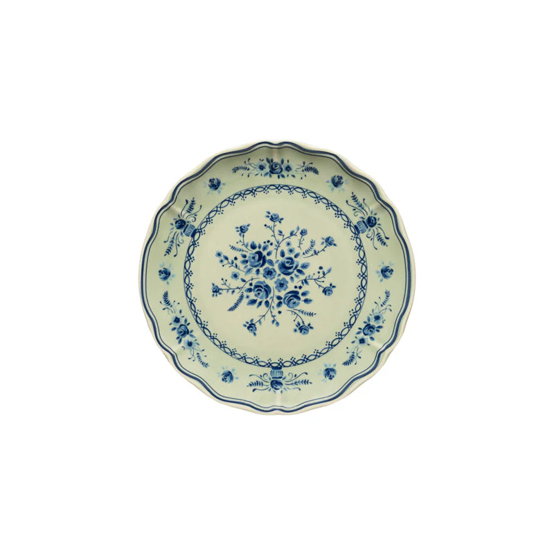 Ceramic plate with blue floral design on a white background