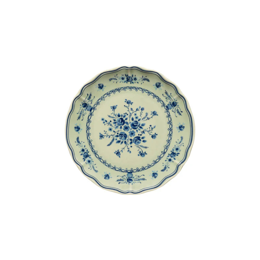 Ceramic plate with blue floral design on a white background
