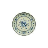 Ceramic plate with blue floral design on a white background