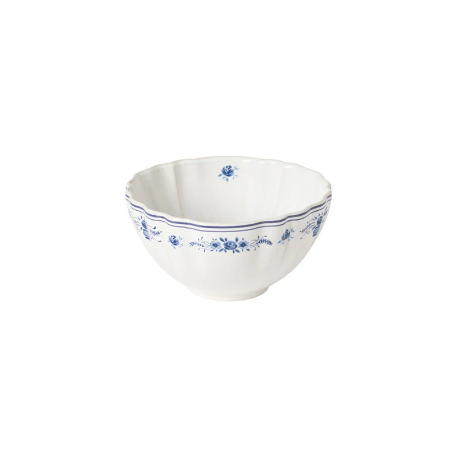 Ceramic bowl with blue floral patterns on a white background