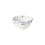 Ceramic bowl with blue floral patterns on a white background
