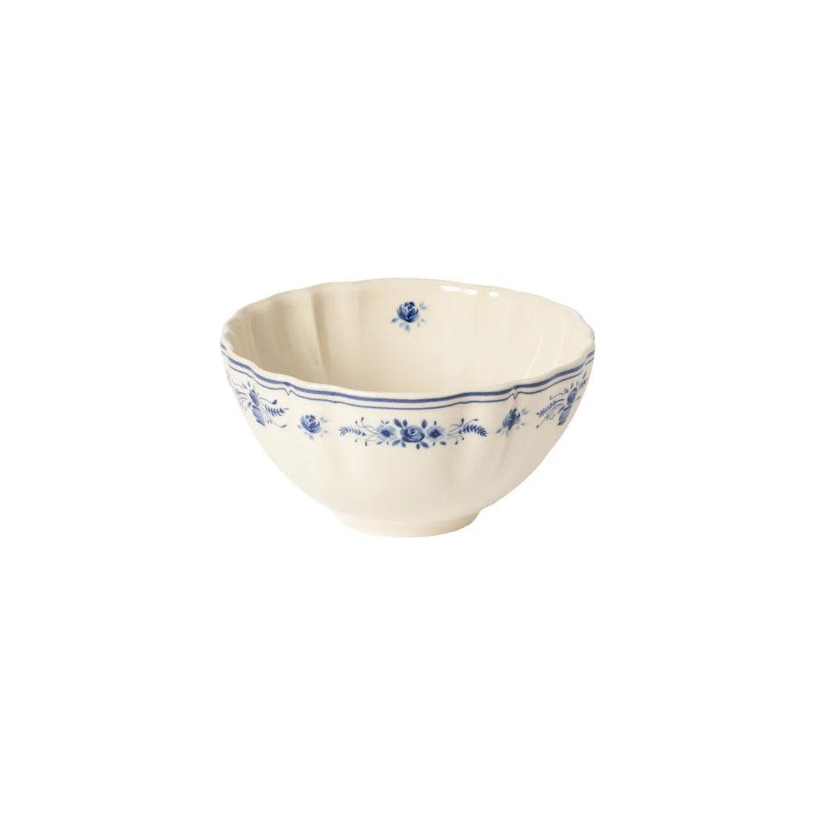Ceramic bowl with blue floral patterns on a white background