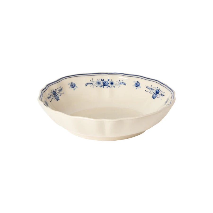 Ceramic bowl with blue floral patterns on a white background