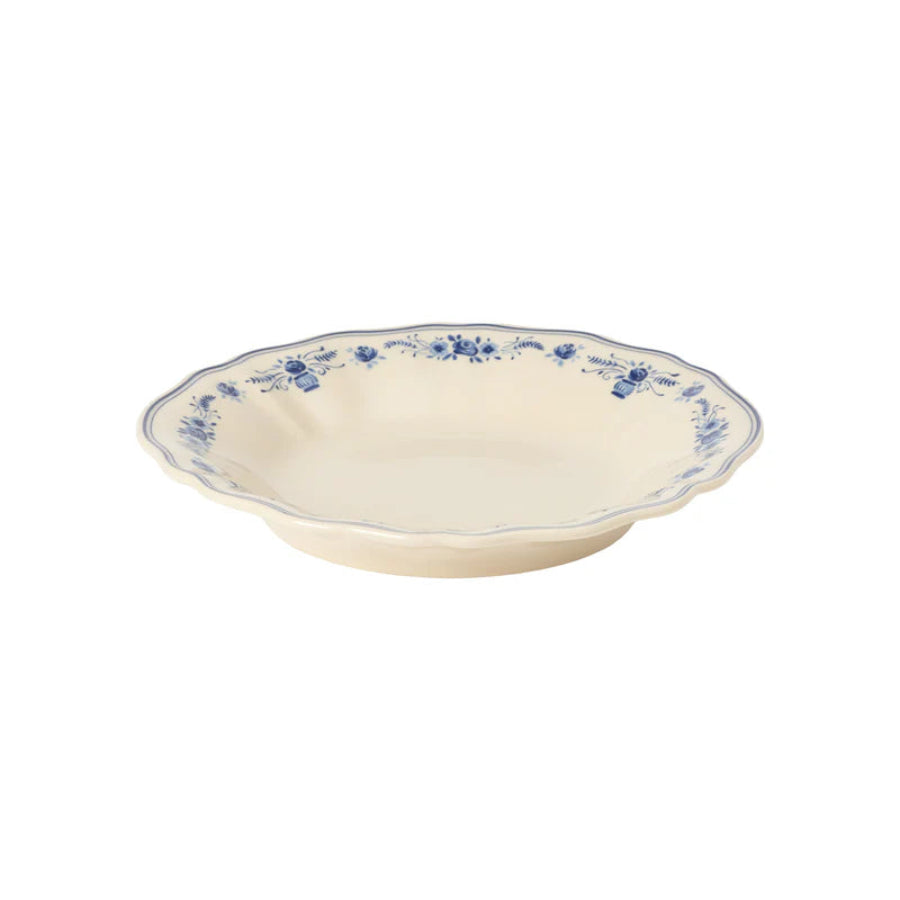 Ceramic bowl with blue floral pattern on a white background